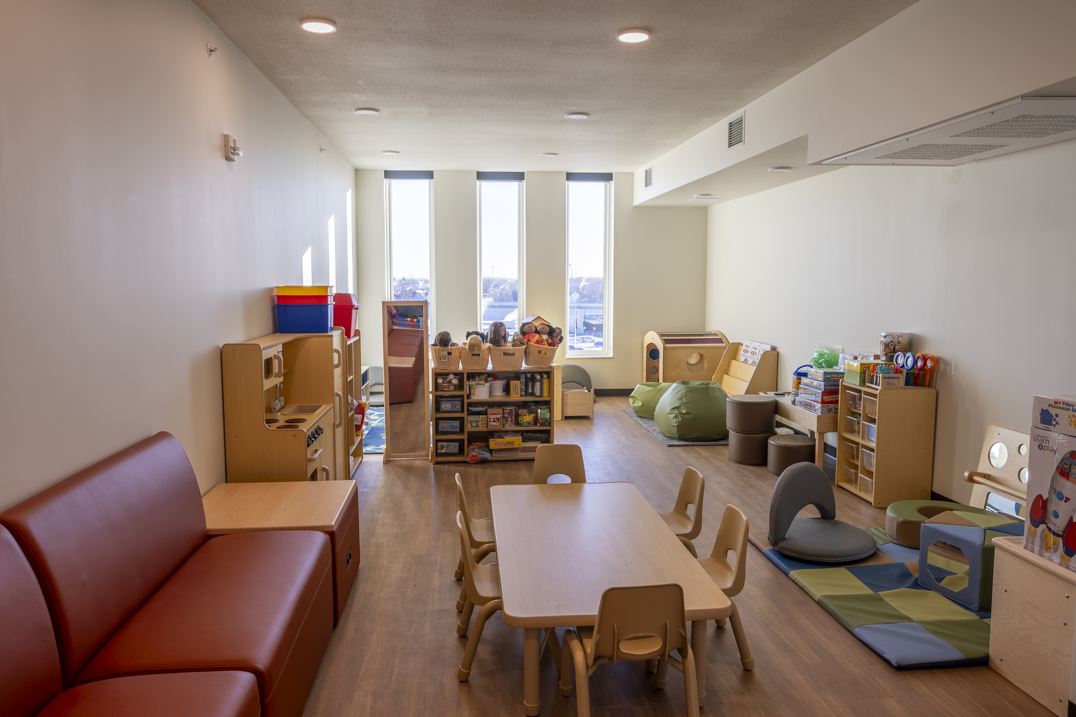 Playroom for children furnished toys and activities for youth