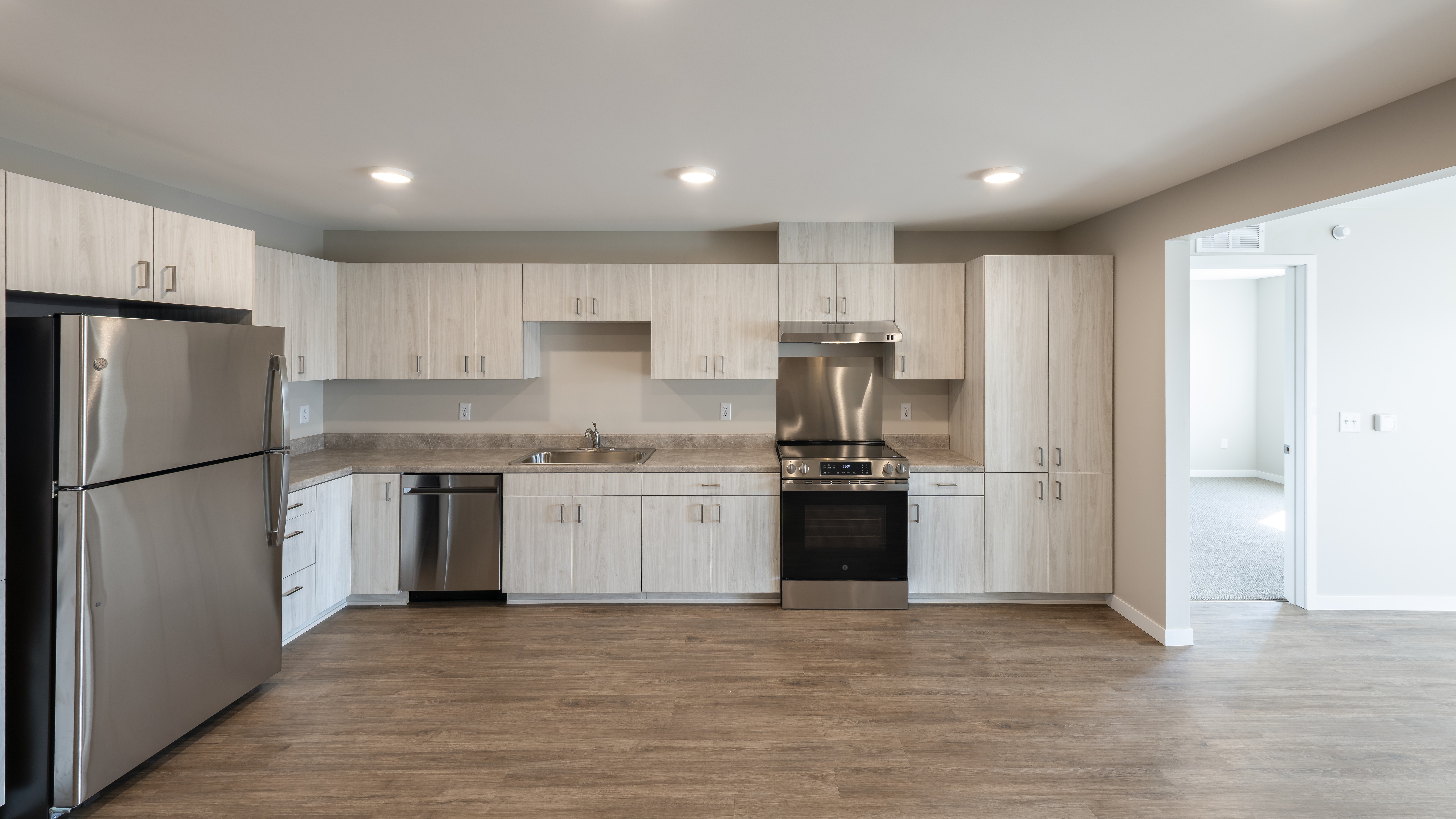 Spacious kitchen with new appliances and plenty of cabinets