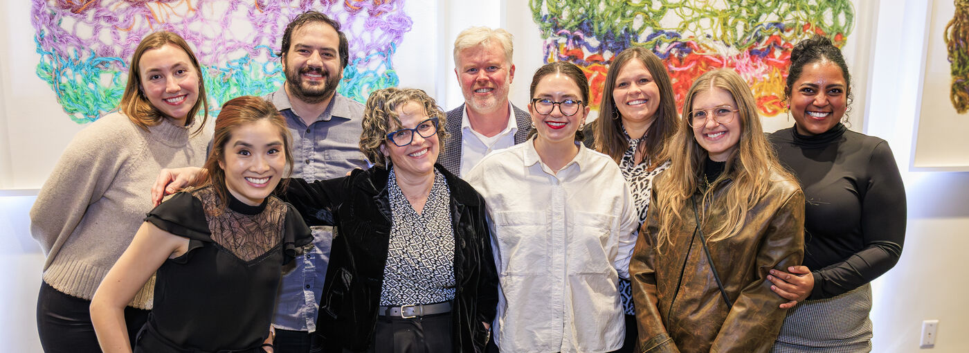 Group of PPL staff standing together and smiling