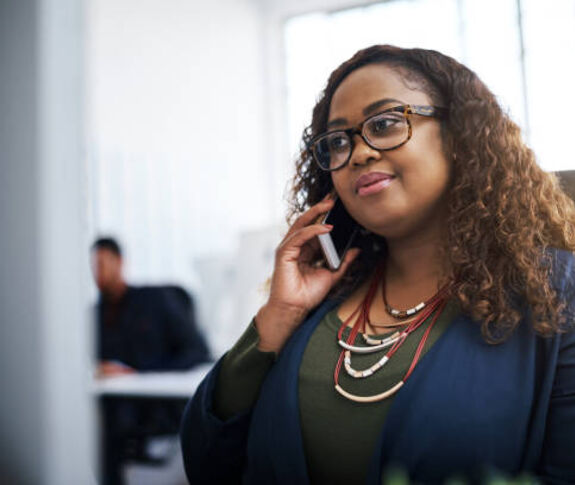 Woman on phone in office