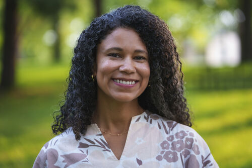 A professional headshot of Kayla Schuchman