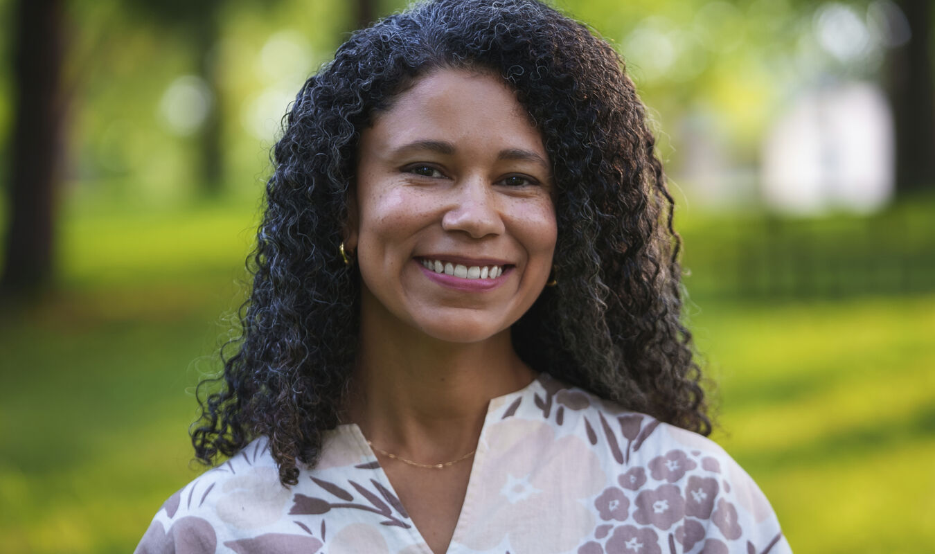 A professional headshot of Kayla Schuchman