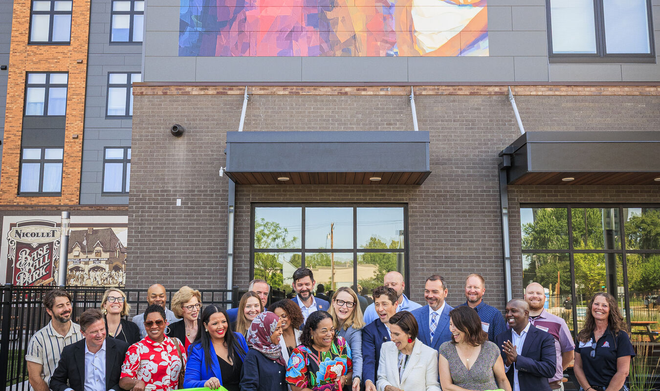 A photo of a ribbon cutting in front of Opportunity Crossing