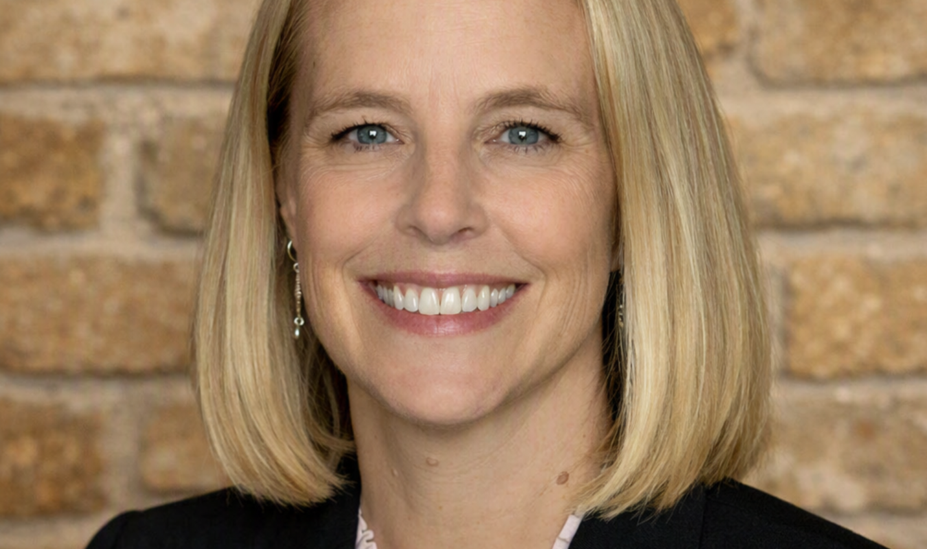 A professional headshot of Britta Reitan
