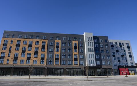 exterior image of opportunity crossing property building - six floors and 110 units
